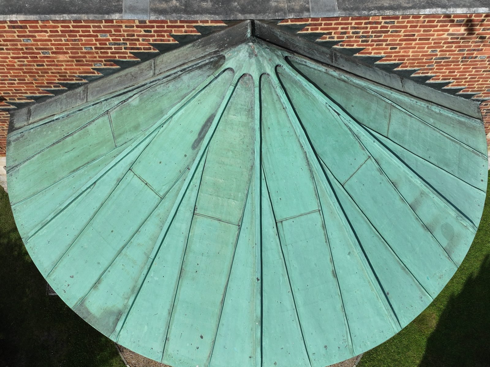 Aerial drone photograph of the copper dome of St Mary Magdalene church, Willen, Milton Keynes, designed by Robert Hooke